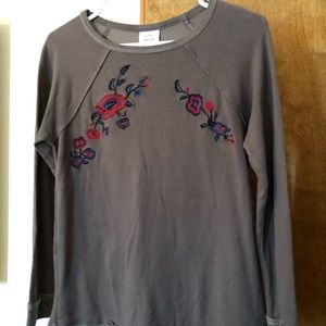 Olive green embroidered top.